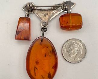 Reverse view of 1970s amber bead brooch from Soviet Russia