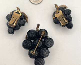 Reverse view of rare 1980s Lucite "Forbidden Fruit" black grapes with black rhinestones brooch and clip earrings set