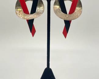 Pair of red and black painted wood and silver circle pierced earrings (possibly sterling). It's the eighties!