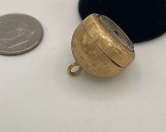 Side view of 14k gold vintage Nastrix Incabloc 17 jewel pendant watch