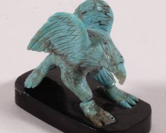 Another view of turquoise carved eagle figurine on plinth