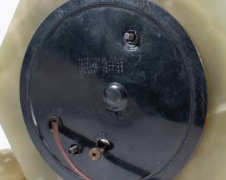 Closeup of the back of vintage Art Deco Master Crafters green marble electric mantel clock