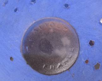 Base of one of the pair of Lalique "Stars" Dans la Nuit post-war glass perfume bottles, decorated with a clear and frosted blue foundation with cut to clear stars. Lalique France mark on base, numbers etched in stoppers' tips. Bottle designed by Lalique for House of Worth. 