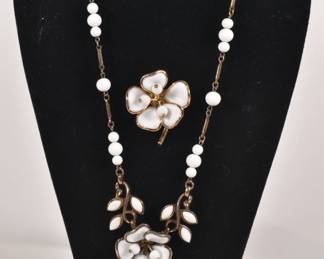 1950s Alfred Philippe for Crown Trifari molded glass camellia flower necklace and brooch - jewelry is made in gold metal featuring white milk glass flowers. The glass petals have been poured into the metal frame and the stamen in the center consist of 3 white glass beads.