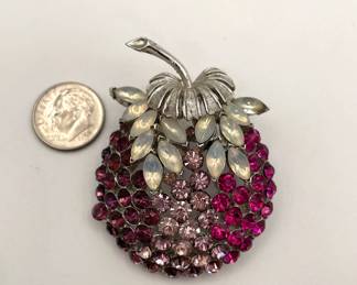 Coro Pegasus berry brooch, signed; rich pink and ruby color rhinestones sparkle in silver tone setting; pale navette stones at the top; signed