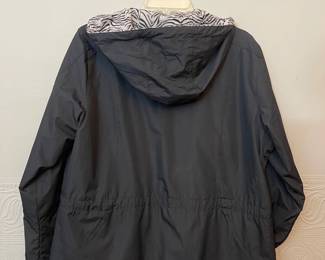 Back view of fleece-lined black outerwear zippered jacket