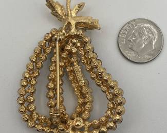 Reverse view of Coro Croft pear brooch, faceted black and white glass beads and gold tone metal