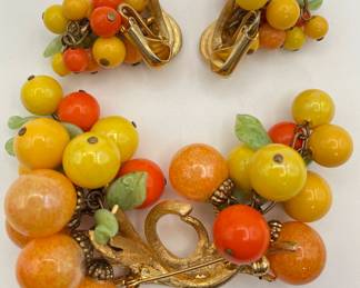 Reverse view of vintage fruit salad costume jewelry brooch and earrings set