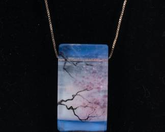 Art glass rectangular pendant, delicate flowering branch against water and sky