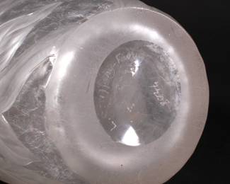 Base of TIFFANY STUDIOS fine wheel-carved vase. Rare rock crystal glass vase with magnolias, New York, ca. 1906; wheel-carved and martelé texturing; etched L.C. Tiffany - Favrile, and numbers 4238A and 7208; size 9 1/2" x 4 1/4"