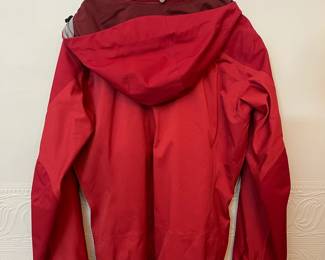 Back view of Patagonia women's outerwear red hooded zipper front jacket, size L