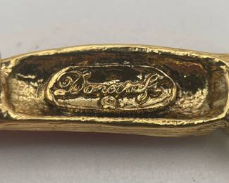 Closeup of maker's mark on Danecraft matching carrot brooch and dangle earrings set - the earrings with rabbits!