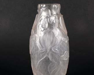 TIFFANY STUDIOS fine wheel-carved vase. Rare rock crystal glass vase with magnolias, New York, ca. 1906; wheel-carved and martelé texturing; etched L.C. Tiffany - Favrile, and numbers 4238A and 7208; size 9 1/2" x 4 1/4"