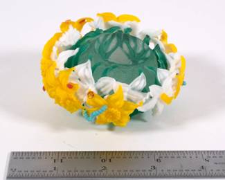 Barry Sautner art glass paperweight, clear inner sphere wreathed in green stems and white and yellow daffodil blossoms, adorned with caterpillars and insects