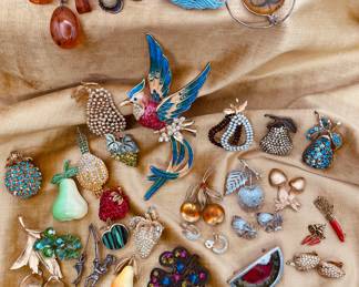 Just some of the incredible vintage brooches and earrings in this sale - including ones by Pell, Loran, Crown Trifari, Coro, BSK, Napier, and more!