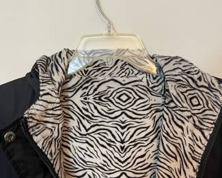 Closeup of fleece-lined black outerwear zippered jacket