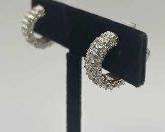 Another view of Monet pair of silver tone rhinestone half hoop clip earrings