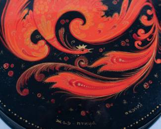 Closeup view of vintage Russian hand painted lacquer round box with firebird design; signed, USSR