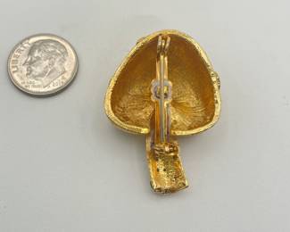 Reverse view of very cute dimensional mushroom brooch, gold color over metal, with clear rhinestones
