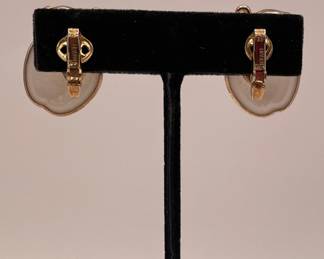 Back of Crown Trifari apple earrings, milk glass and gold tone metal