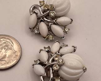 Another view of Crown Trifari milk glass and rhinestone clip earrings