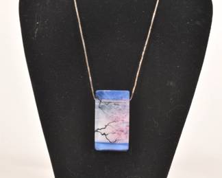 Art glass rectangular pendant of delicate flowering branch against water and sky
