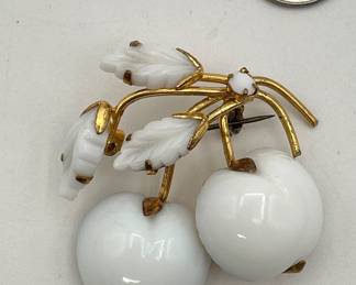 Vintage Austria milk glass cherries and leafs brooch, set in gold tone metal, marked Austria on the back. 