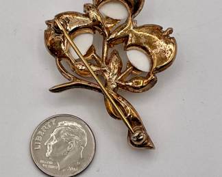 Reverse of Crown Trifari molded glass ribbed melon brooch