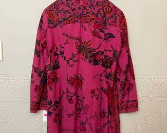 Back of women's long sleeve button front patterned top - deep pink with floral pattern, Mandarin style collar, bells for buttons