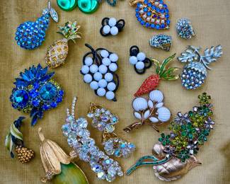 Group shot of the stylish and occasionally whimsical costume jewelry in this sale