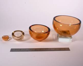 Another view of the art glass set of amber color nesting bowls on signed glass pedestal, Harvey Littleton, the late artist who helped found the studio glass movement in the United States