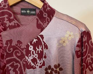 Closeup of Connie's Moonlight in Los Angeles mauve and maroon long-sleeved tunic top with burned out velvet patterning