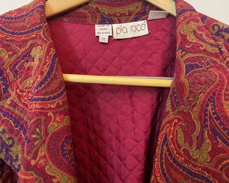 Closeup of Pia Rucci lined paisley fabric top, open front, lapel collar, size M 