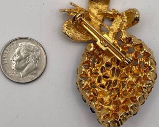 Reverse of Faux Pearl and blue rhinestone brooch, gold tone metal leaves and frame