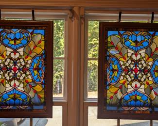 Yes, shoe loved her stained glass - here's another matched pair of nicely colored stained glass panels.