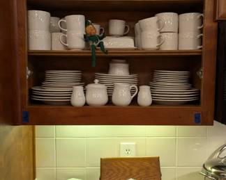 Assorted cookbooks, Villeroy & Boch Cathedral teapot and entire set of everyday stoneware.