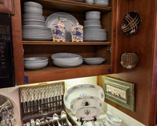 78-piece set of "Iroquois Blue" stoneware, by Russel Wright (1949-1967), vintage cookbooks, entire service for 12 of Rogers Bros. "Old Colony" silver plated flatware in wooden box, English Sheffield steak knife set NIB, collection of three Colonial Williamsburg slip-glazed redware bowls and 5-piece set of porcelain servers by White Block JLB Porcelain, Czechoslavakia. 
