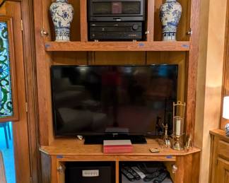 Large flat-screen TV, w/all the necessary audio equipment to thrill all of your senses, pair of 22" tall Asian blue/white porcelain lidded jars.