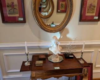 Vintage wooden side table, w/candle slide, by Biggs Furn. Co., double crystal snowflake, by Frabel, signed alabaster female bust by Italian artist, one of a pair of vintage gilt wood oval mirrors, pair of framed, antique English magazine ads and set of 3 hand-painted floral plates, England. 
