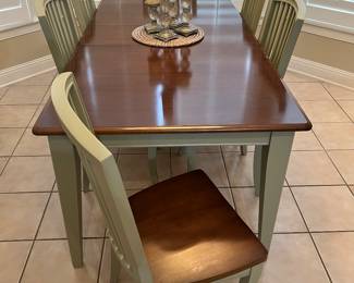Bassett table with eight chairs.