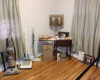 Several Vacuu.s, Montgomery Wards Sewing Machine in Cabinet and Variety of Sewing Goodies!