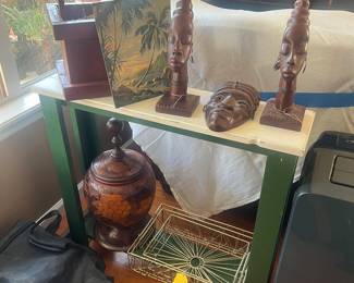 Haitian wood carvings 
Slim and tall table 
Wishing well