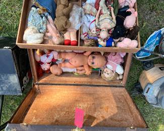 Antique trunk filled with antique collectible dolls 