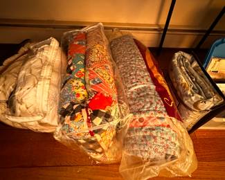 Quilts in plastic bags! NICE!