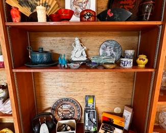 Another section of wall filled with treasures! Asian pieces, art and vintage cameras! 