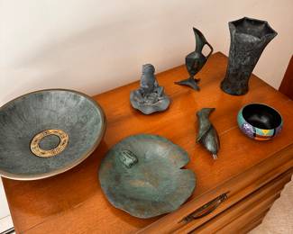 A nice assortment of copper green tchotchkes!