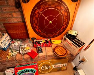 The heart of the fireplace is filled with toys and games! Vintage to new! 