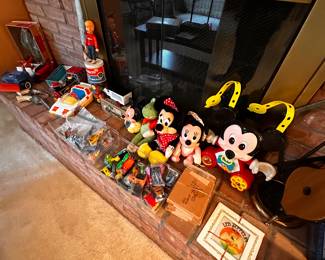 The heart of the fireplace is filled with toys and games! Vintage to new! 