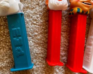 A large assortment of Vintage PEZ Dispensers! Here are 4 that are Christmas Themed!