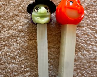 A large assortment of Vintage PEZ Dispensers! Here are 2 that are Halloween Themed!